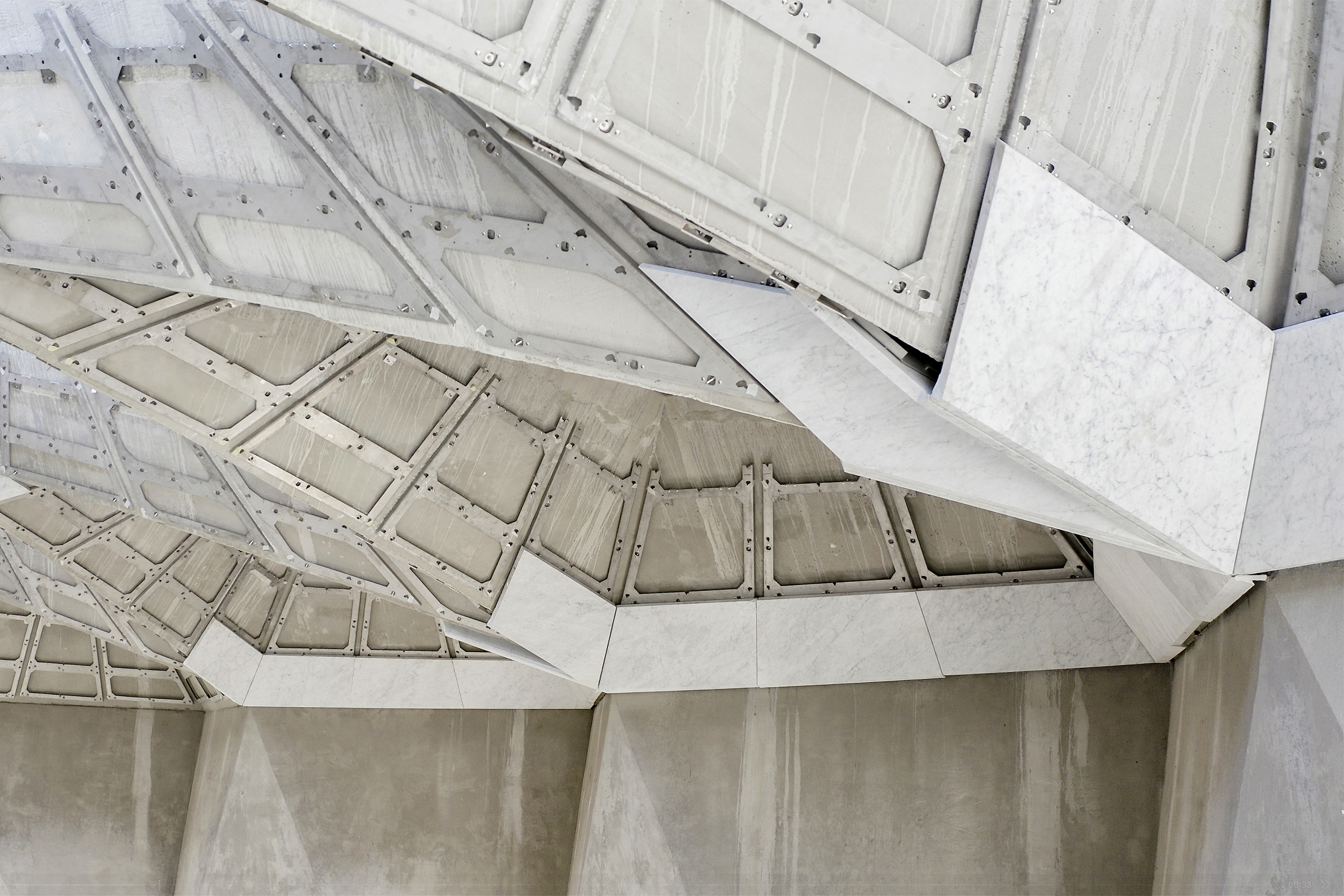 Marble installation begins under the trellis, work on paths advances, landscaping and ‘Akká Visitors’ Centre near completion—marking major progress at the site. 