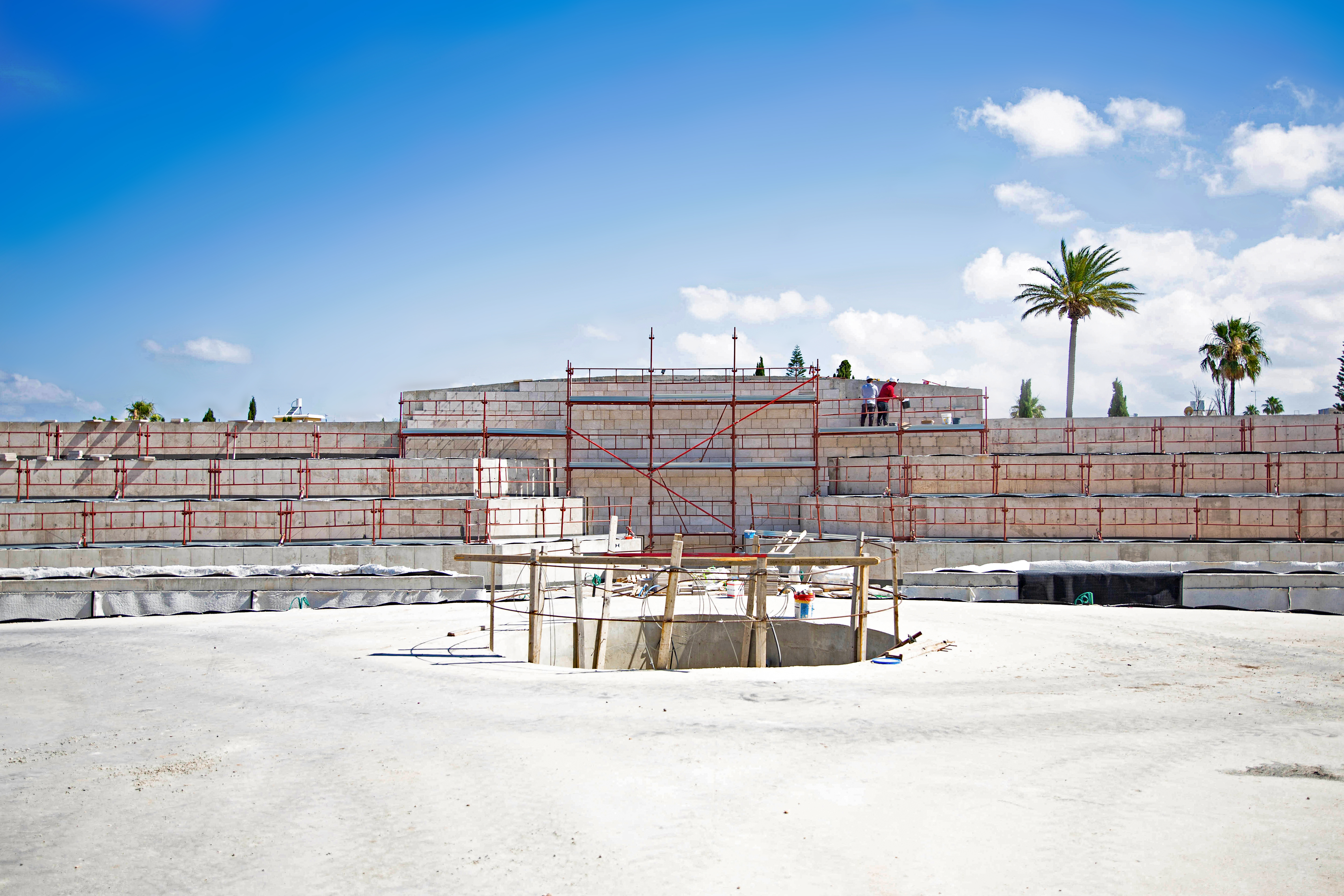The garden planters in the north plaza from the point of view of visitors as they exit the Shrine.