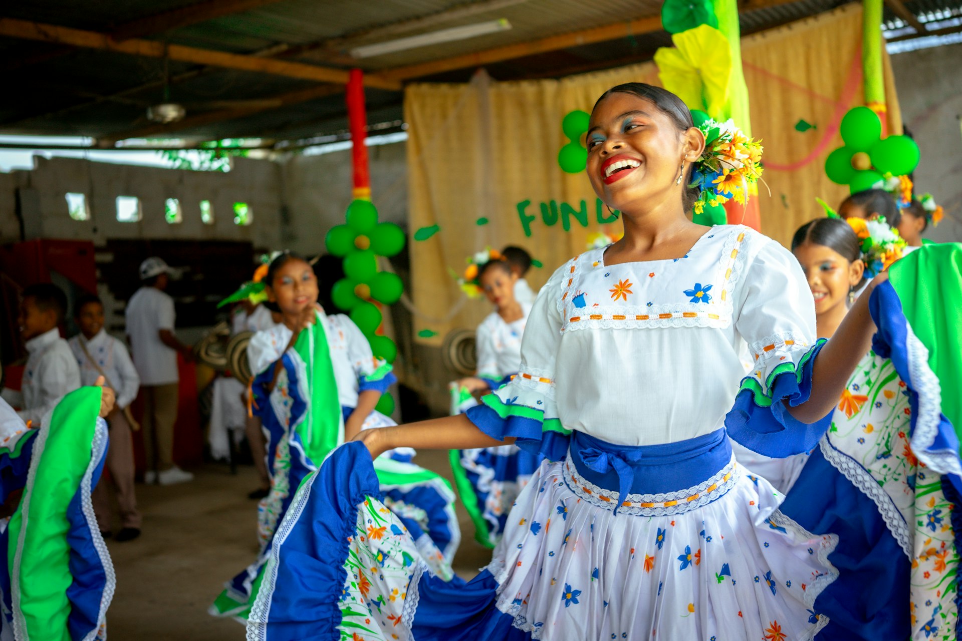 Another view of dancers performig at a local gathering in celebration of FUNDAEC's 50th anniversary.