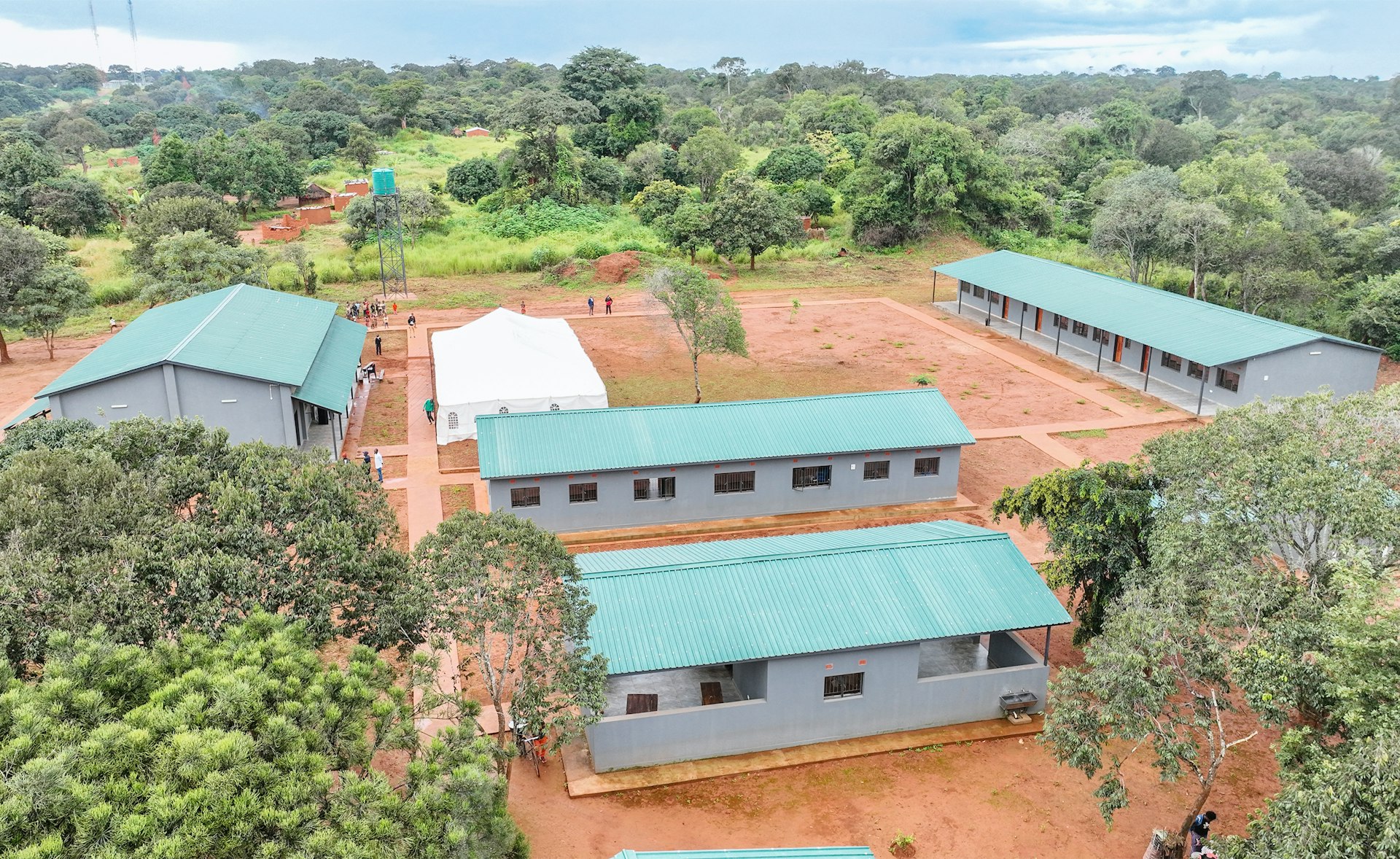 Aerial view of Kaseloki Secondary School, the first community secondary school in Mwinilunga district, alongside a community center.
