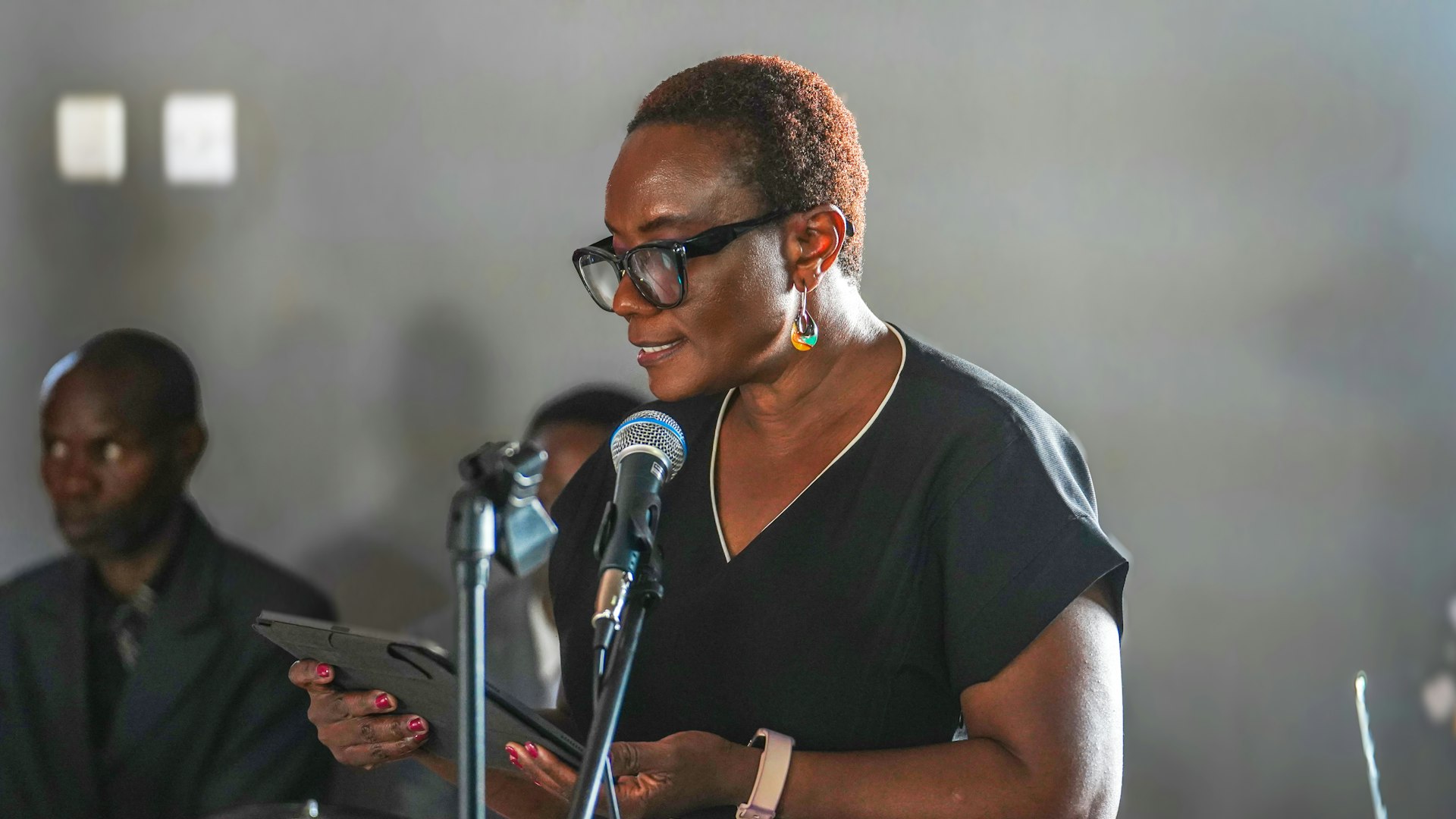 Musonda Kapusa-Linsel, a member of the Continental Board of Counsellors in Africa, addressing participants at a gathering following the opening of the school.