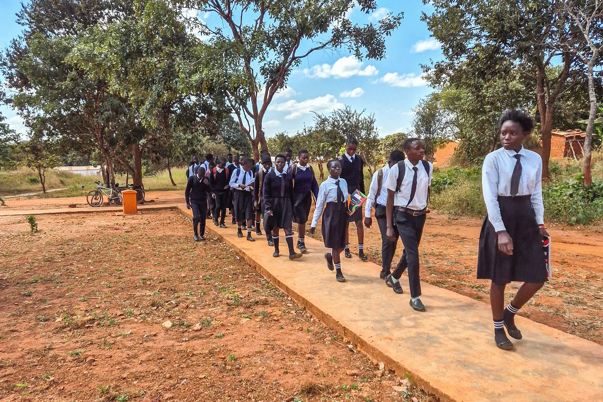 Students arriving at the school.