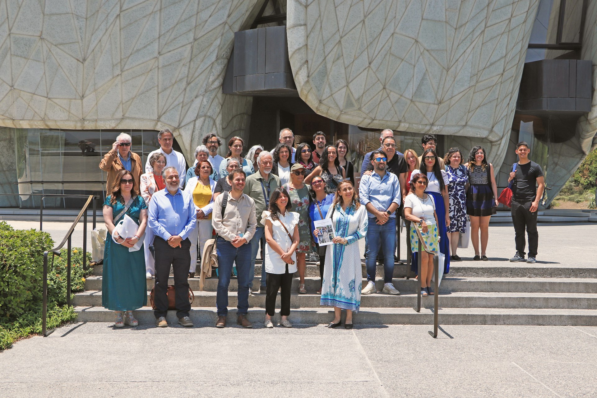 A group photo from the publication launch event that was held at the Bahá’í House of Worship in Santiago.