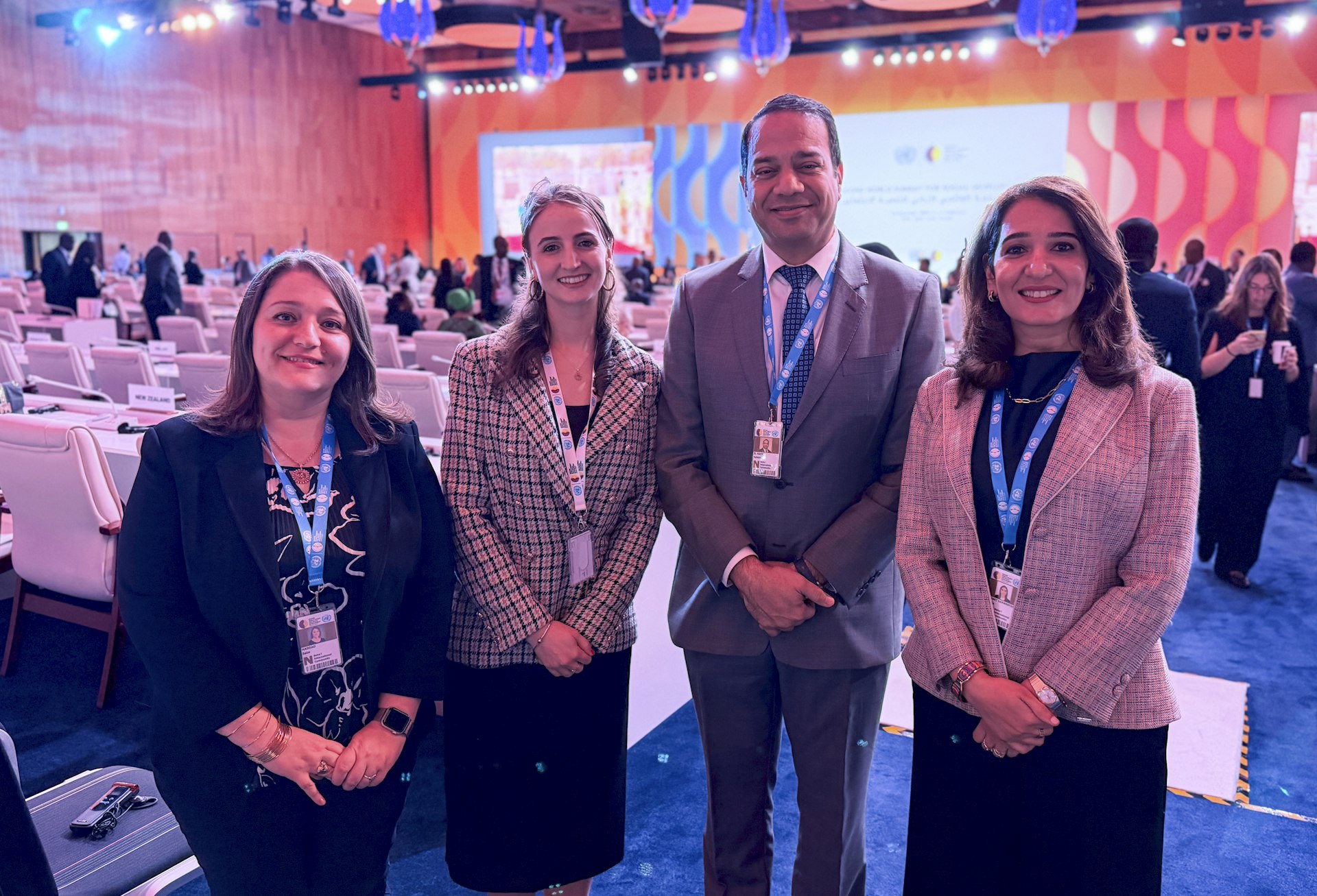Some of the members of the BIC delegation to the Summit, from left to right: Saba Haddad, representative of BIC’s Geneva Office; Cecilia Schirmeister, representative of BIC’s New York Office; Hatem El-Hady, representative of the BIC’s Cairo Office; and Roeia Thabet, member of the Bahá’í Office of External Affairs of the UAE.