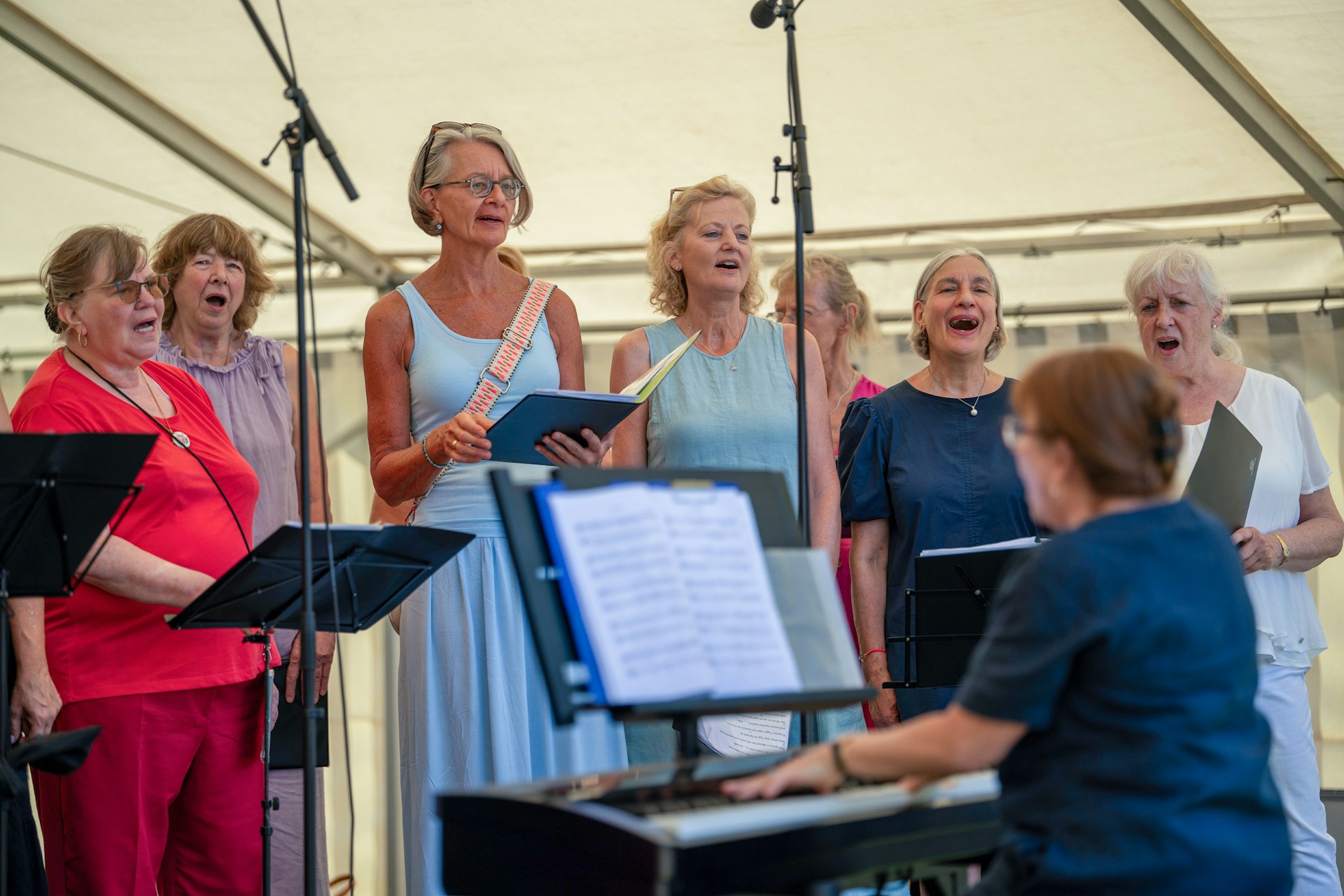 Stage performances featured local and regional choirs, musicians, poets, actors, and storytellers.