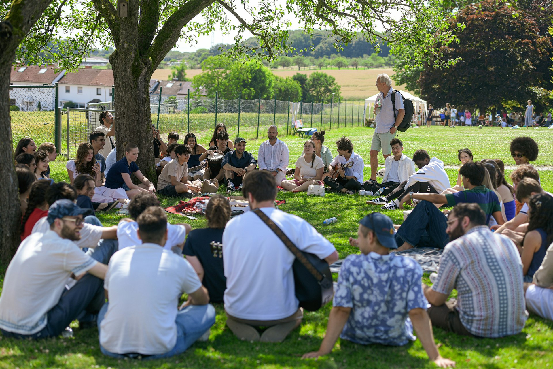 An impromptu gathering of attendees to sing together.