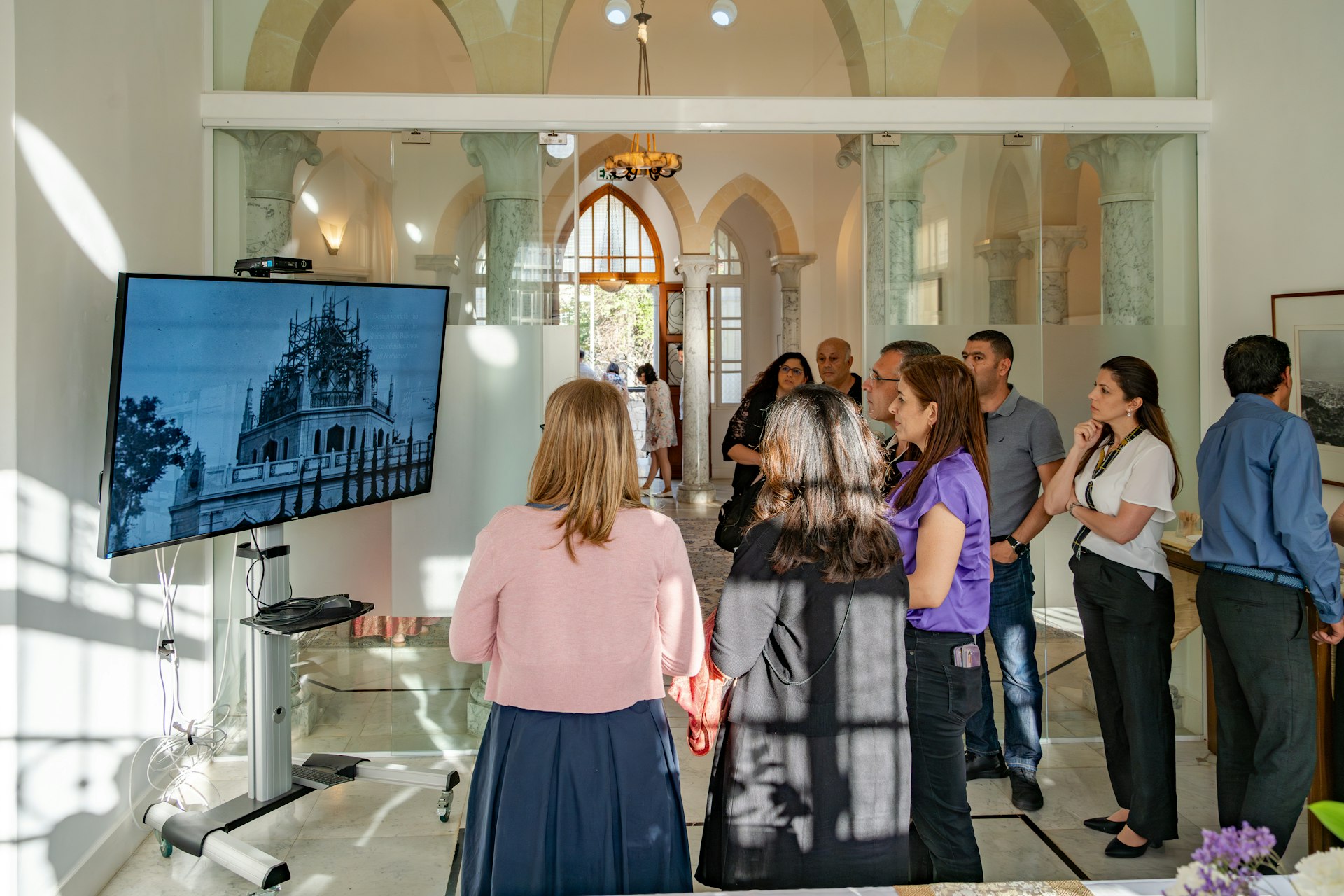 Guests had an opportunity to view presentations featuring historical photographs of the building and another titled Flowers of One Garden that explored the principle of the oneness of humanity.