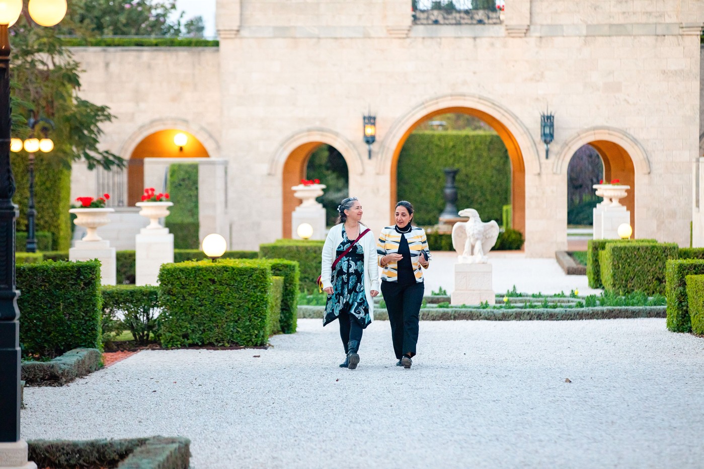Ahead of the gathering’s formal program, participants were invited on a guided walk through the gardens and visit to the Shrine of Bahá’u’lláh.