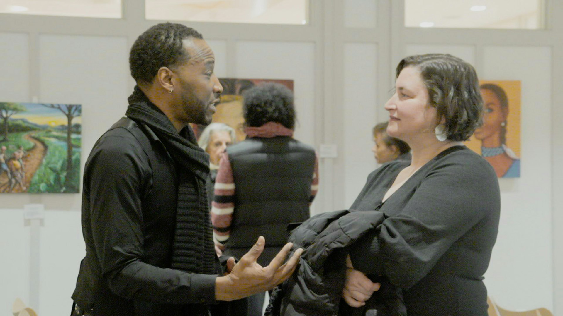 Attendees at the art exhibition.