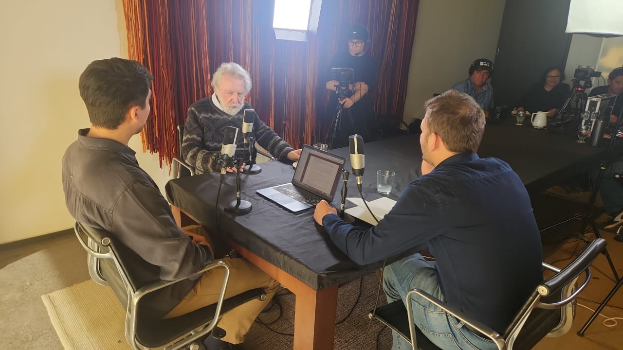 Behind the scenes during the recording of an episode of the podcast.
