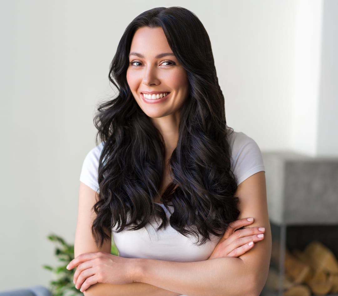 Woman with long curly dark hair