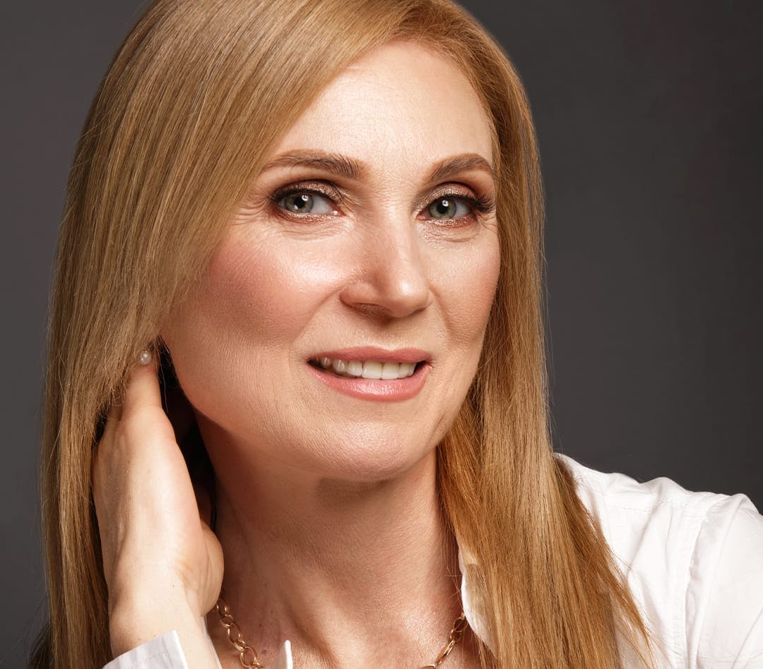 Woman with long strawberry blonde hair