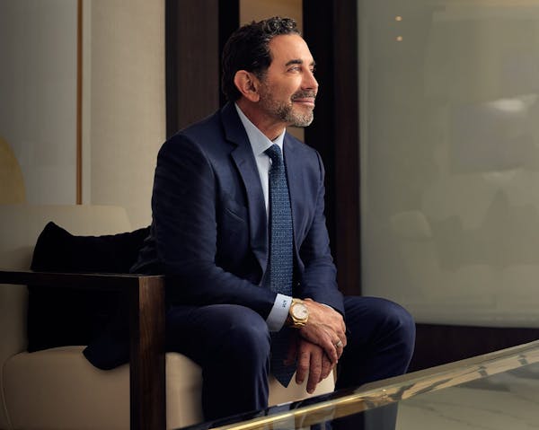 Dr. Paul Nassif sitting