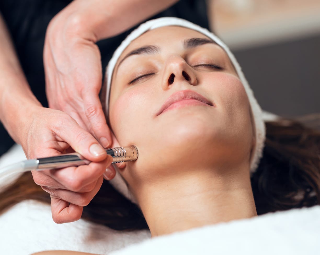 woman receiving aesthetician service