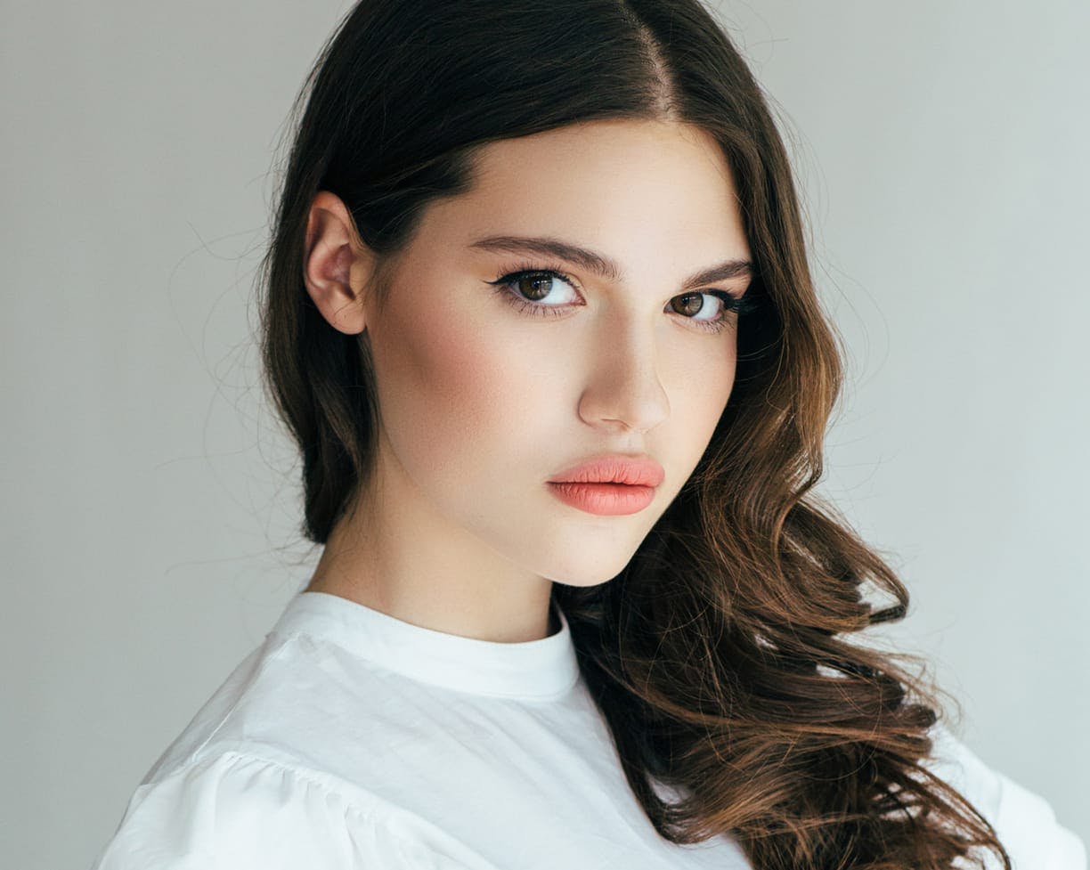 woman with curled brown hair