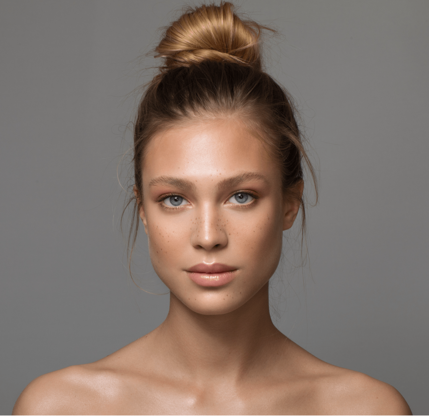 Beautiful woman with her hair up in a bun