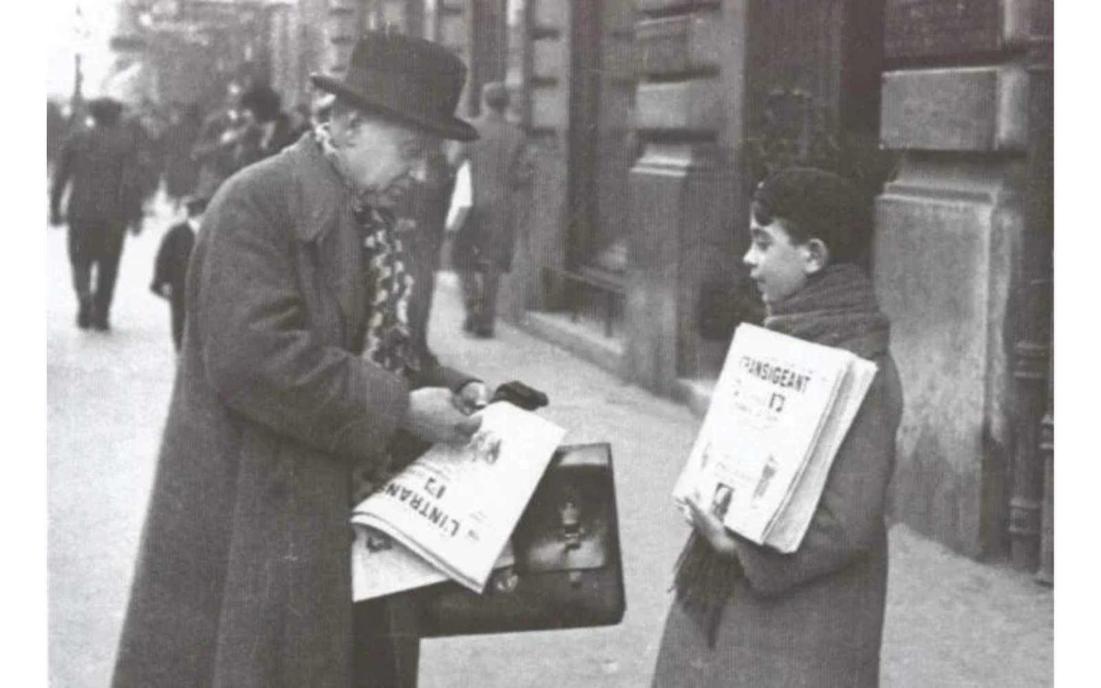 There is only one remaining newspaper hawker in Europe today. A news hawker on the streets of Paris in the early 20th century