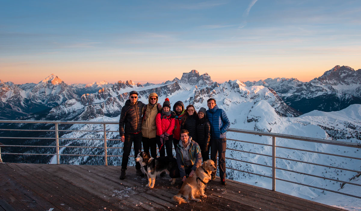 The Hanno team in the Dolomites, in front of a sunset