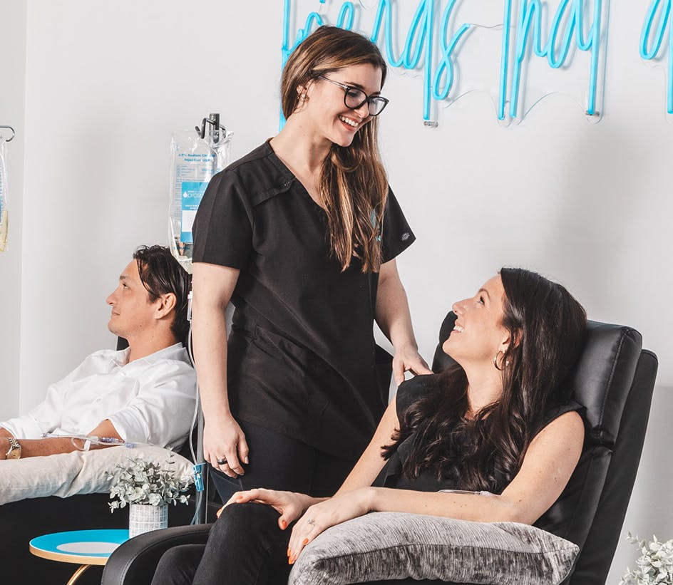 nurse helping iv patient