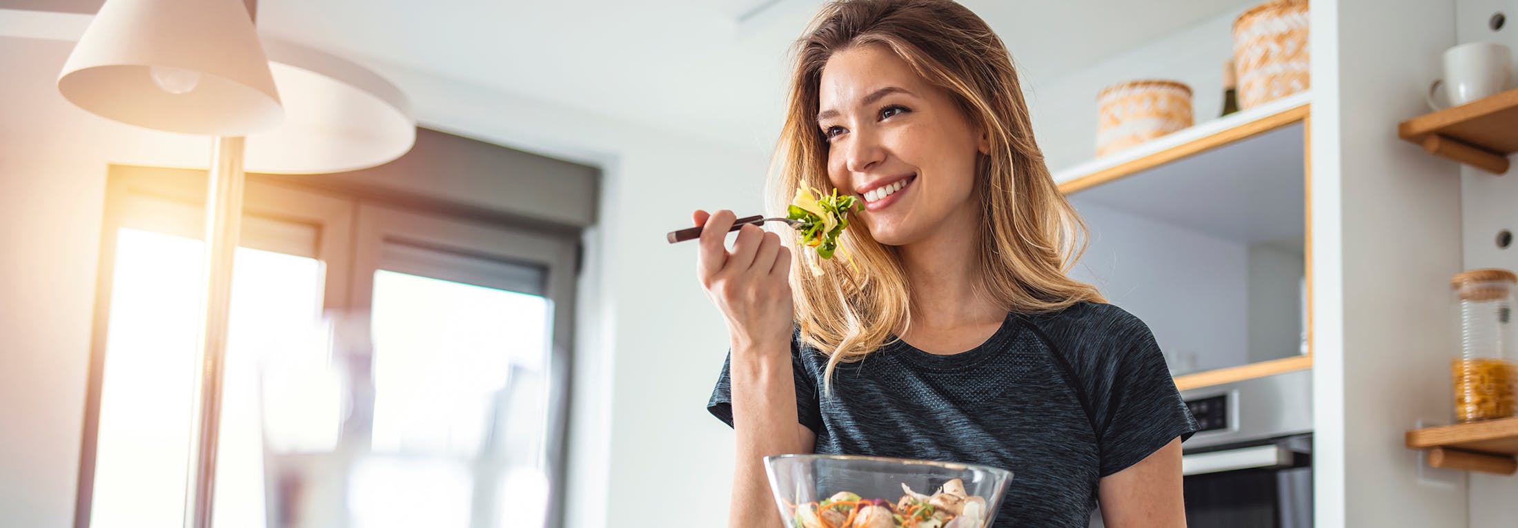 woman eating a salad