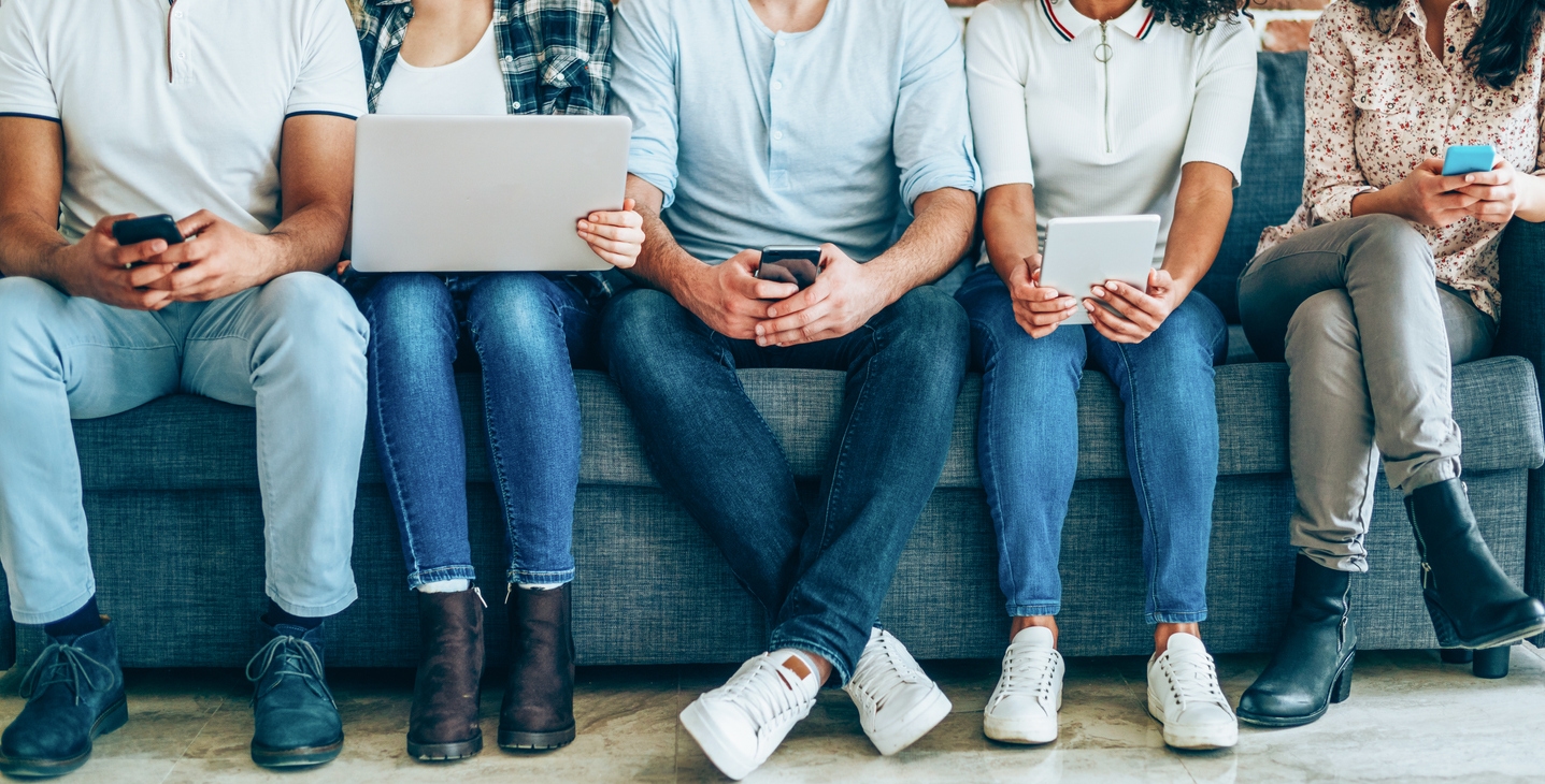 group of people on tablets and phones