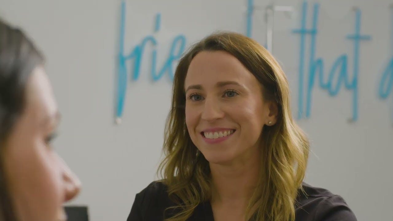 Prosper IV rn assisting a patient with an IV drip