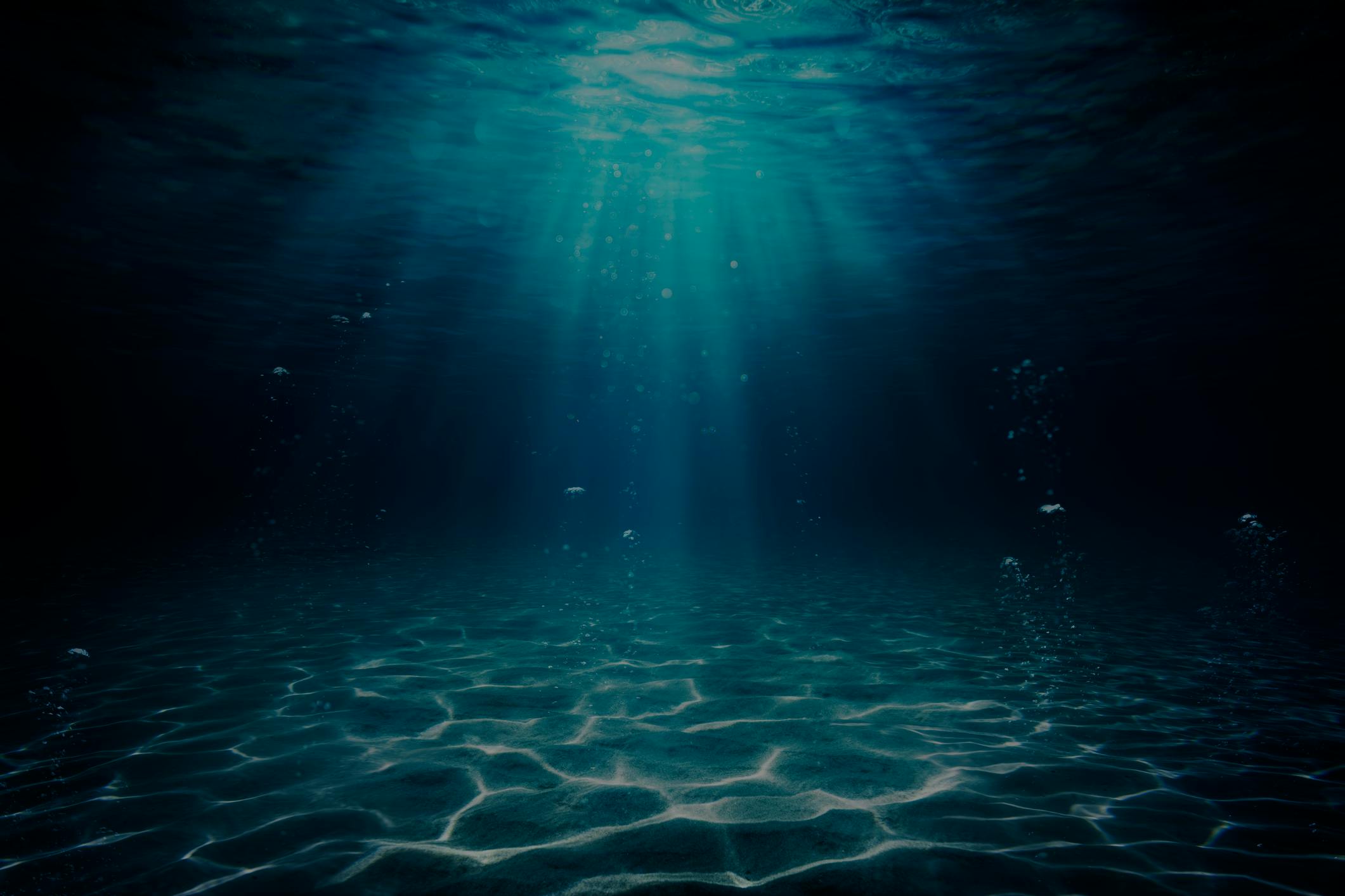 Sun shining though the ocean