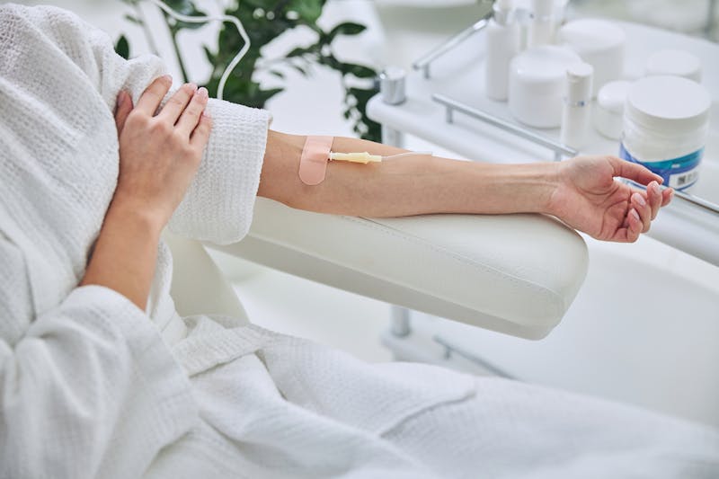Cancer patient receiving IV treatment
