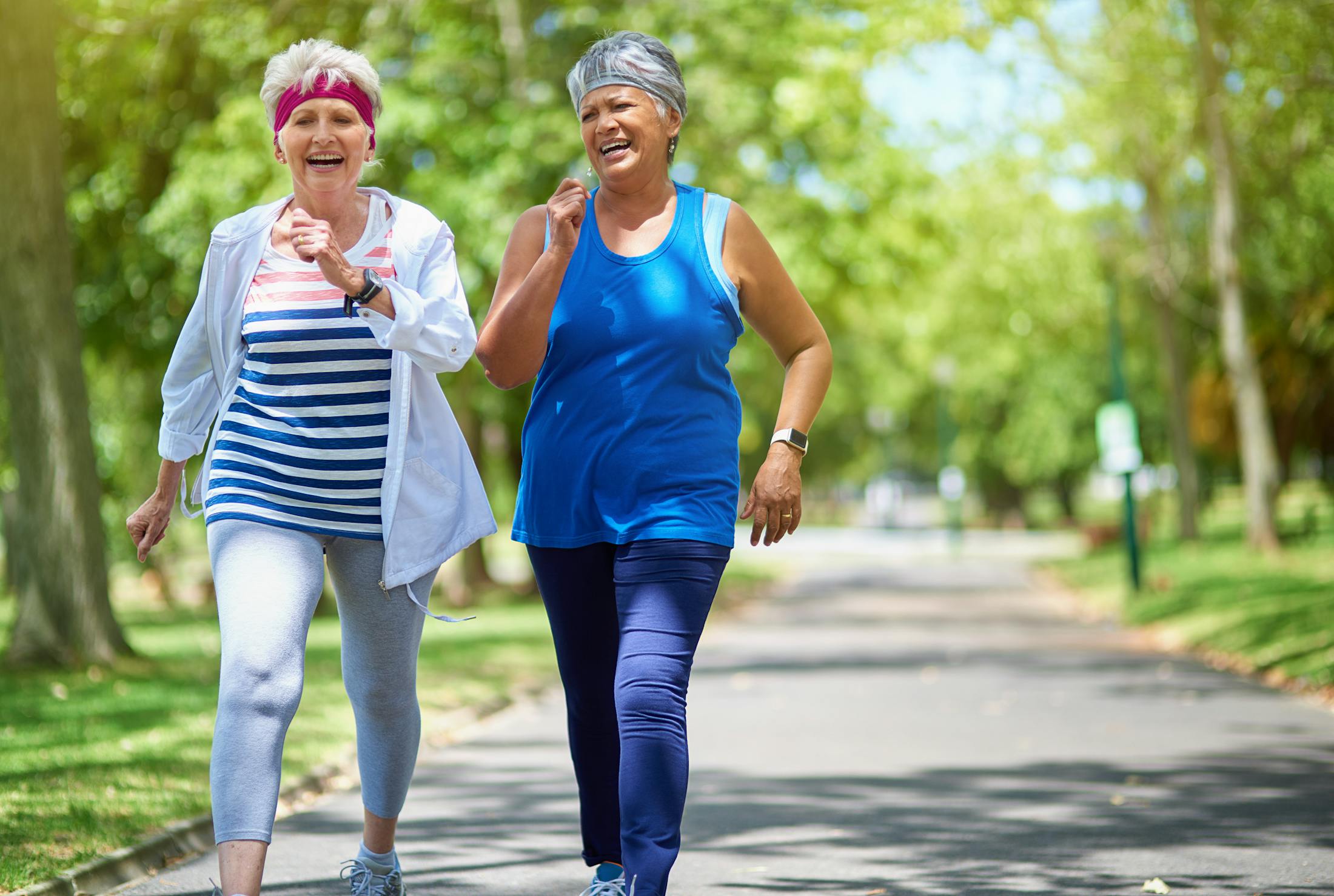 women taking a walk in a park