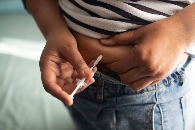 Patient injecting Semaglutide