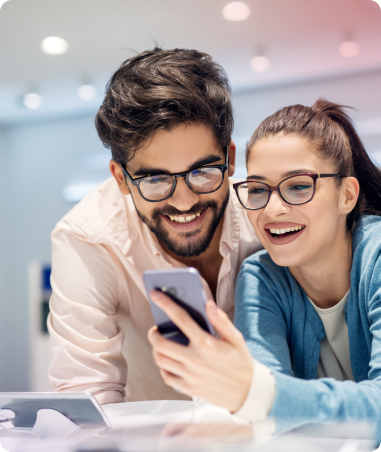 Man and woman using smartphone