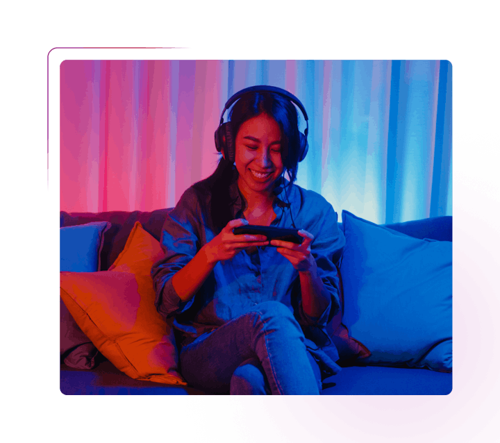 Woman gaming on smartphone