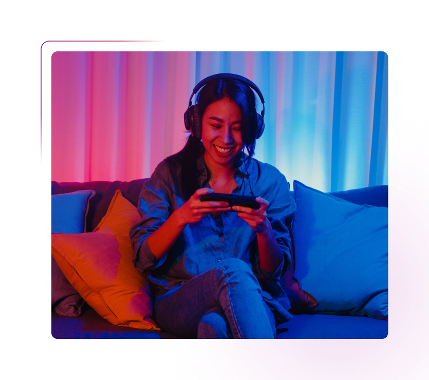 Woman gaming on smartphone