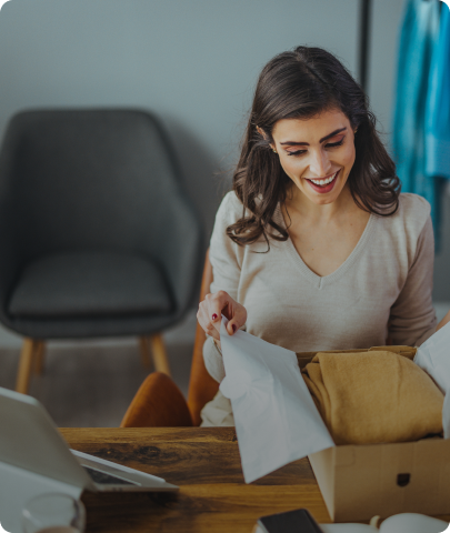 Woman opening a box