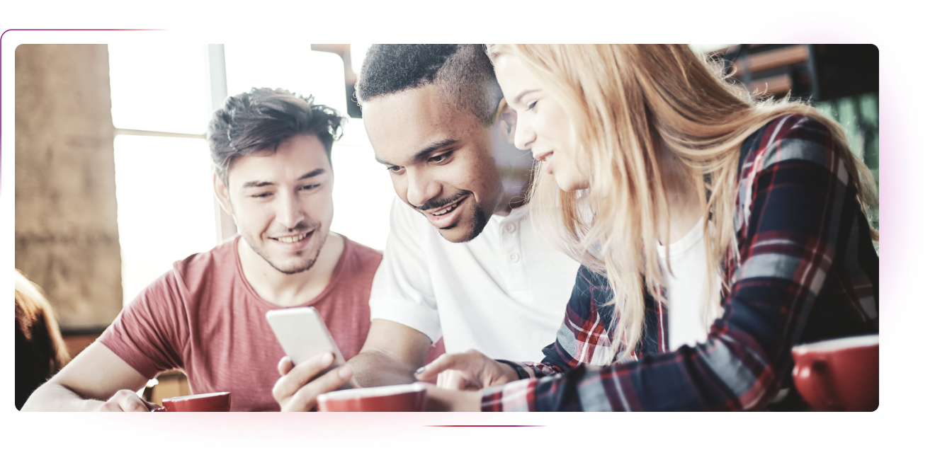 Two men and a woman looking at smartphone screen