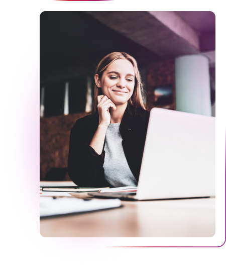Woman sitting in front of a laptop