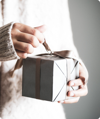 Person unboxing a gift