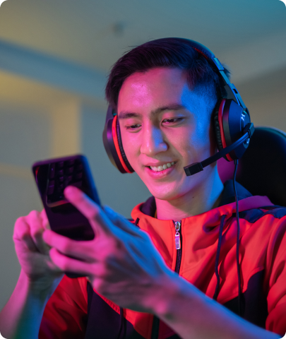 Gamer with smartphone