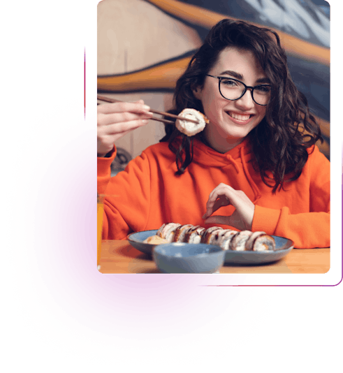 Woman eating sushi