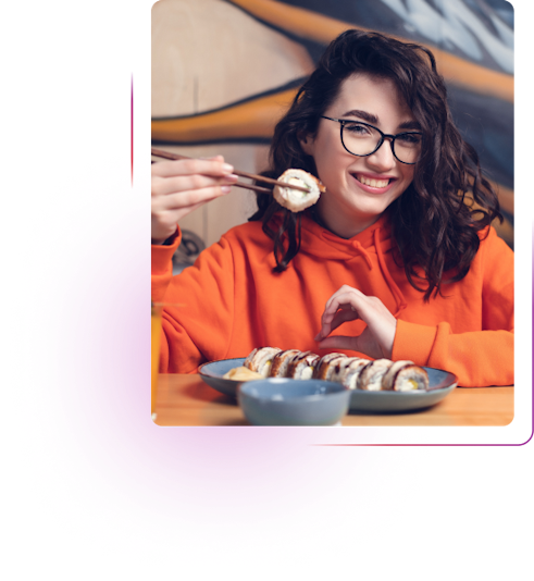 Woman eating sushi