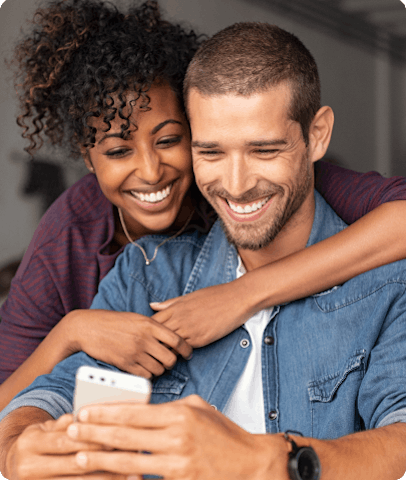 Young couple using an electronic device