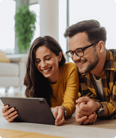 Couple using laptop