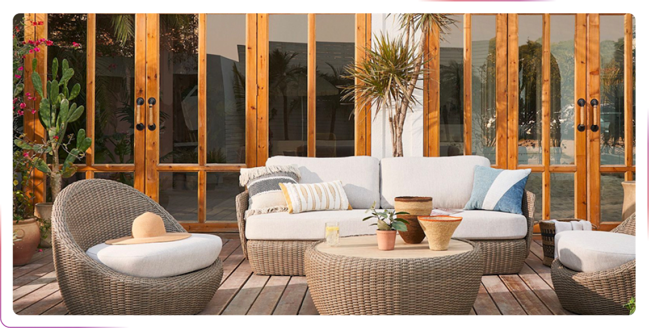 view on the sofa and chairs in the garden