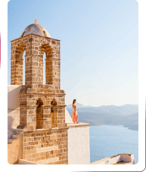 girl standing next to the tower