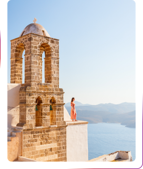 girl standing next to the tower
