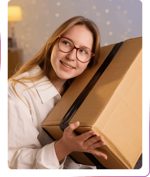 young girl holding a box