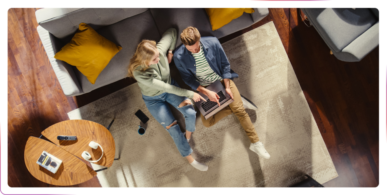 young couple using a laptop