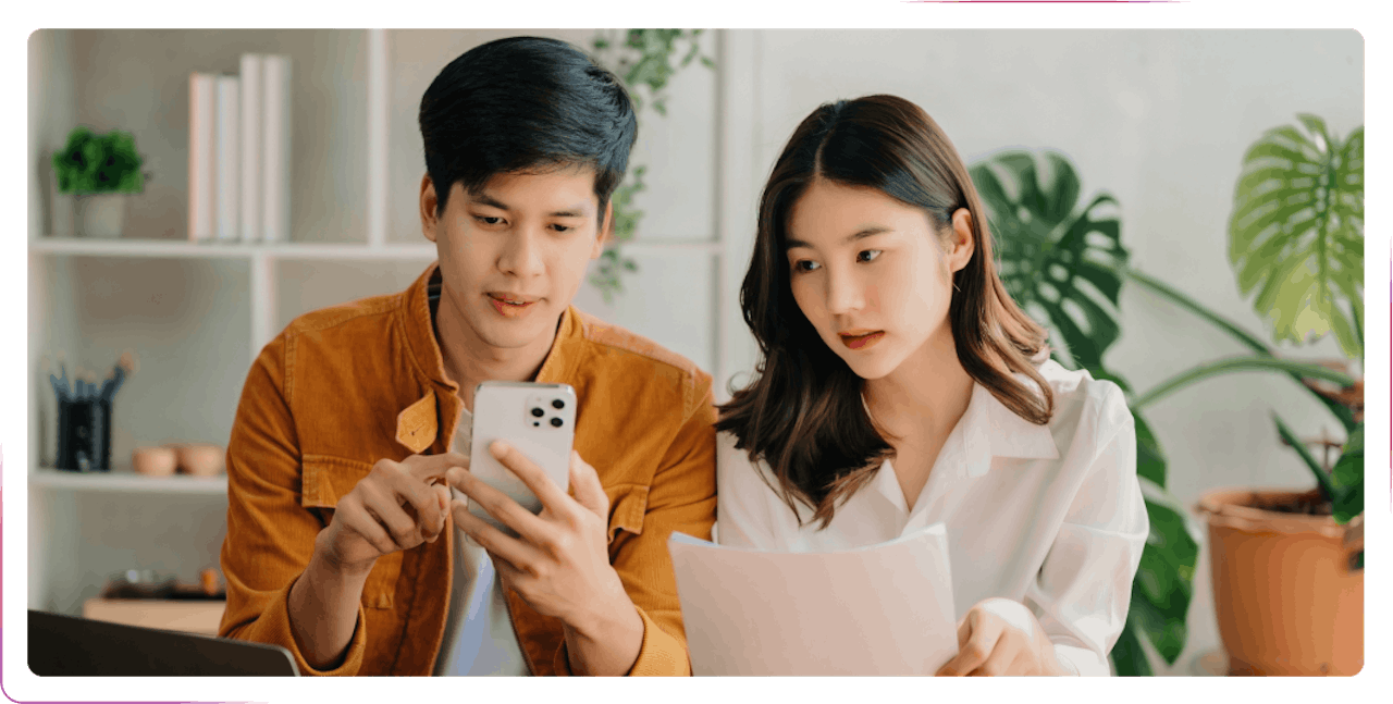 young couple using a phone