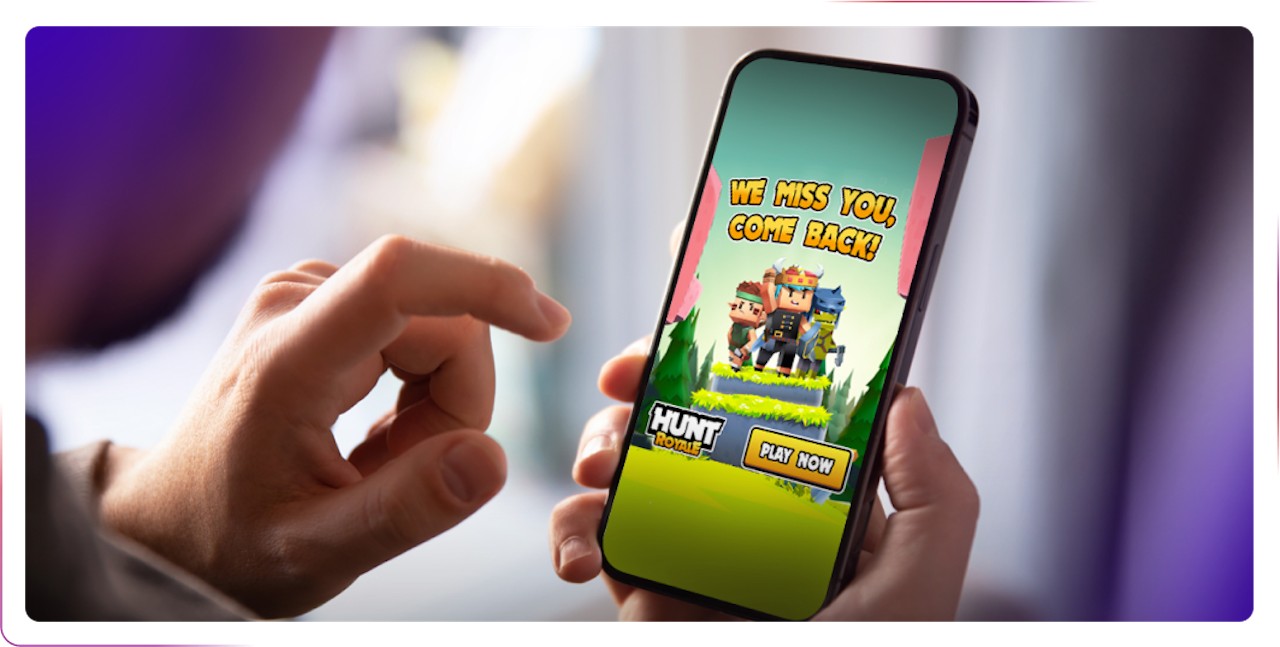 hands using a phone with a hunt game