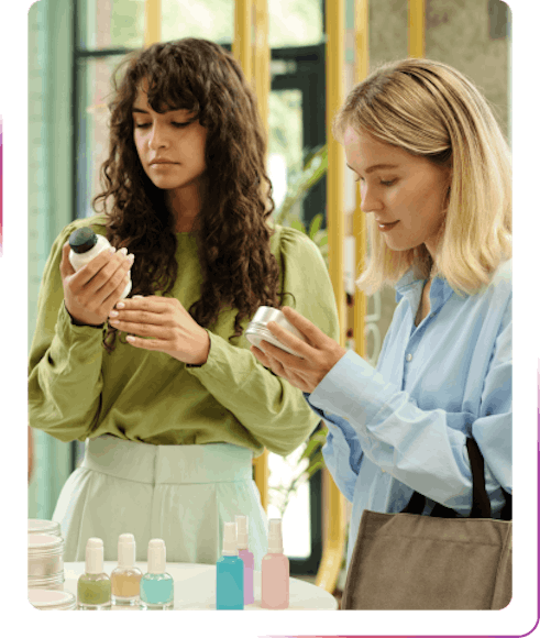 young girls looking at cosmetics